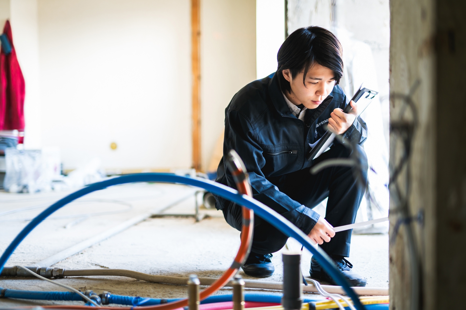 現場での尾崎プランナー